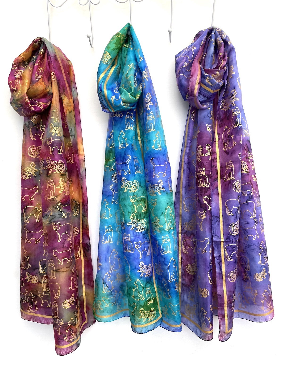 Long-silk-scarves-with-cat-print-in-gold