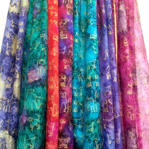 A-range-of-different-coloured-gold-dogs-on-silk